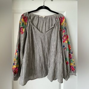 Embroidered top with tassels